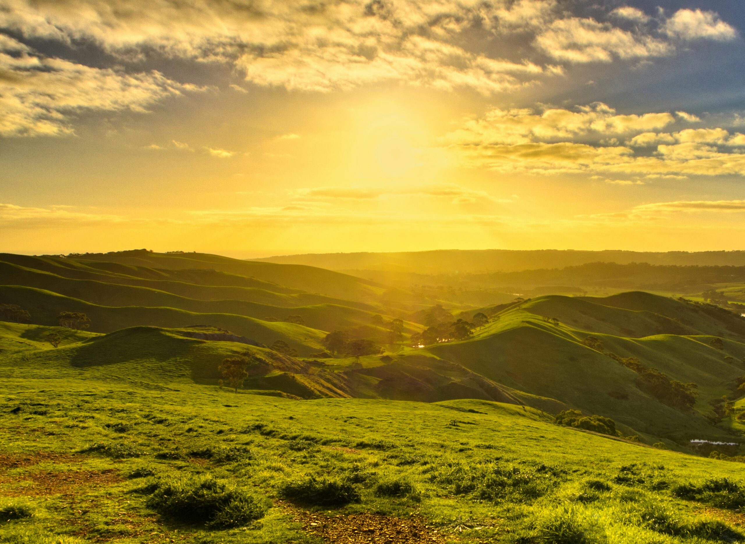 Beautiful sunrise over rolling hills in Yankalilla, South Australia, capturing nature's tranquility.